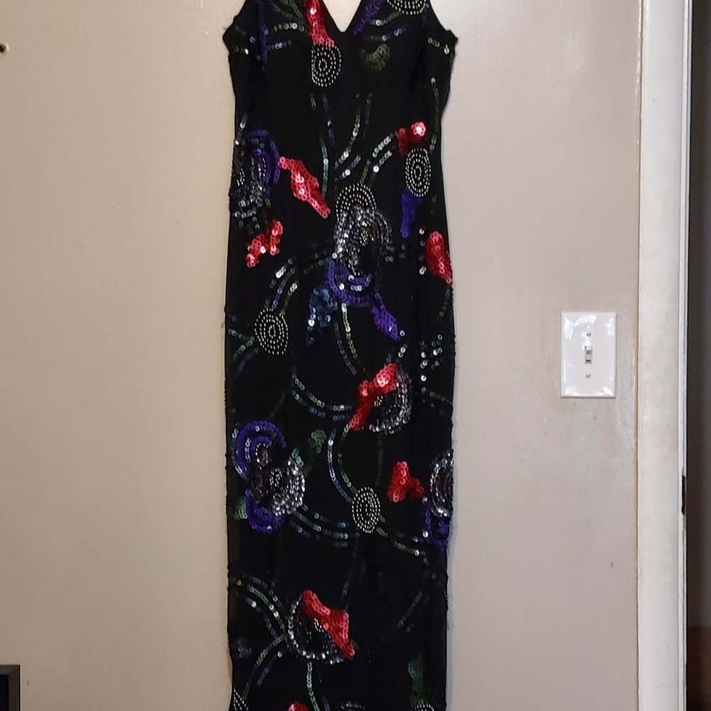 Black colorful sequin gown.